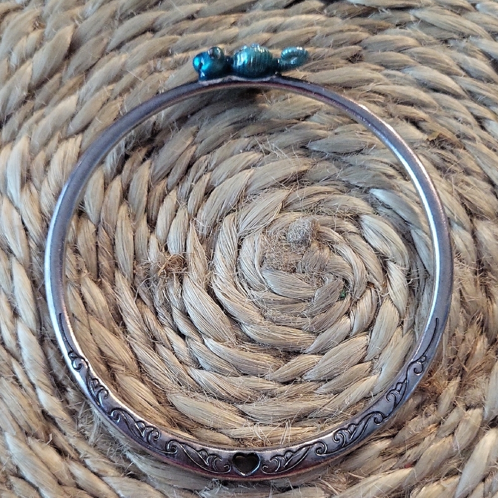 Elegant Silver Bangle with Blue Accents
